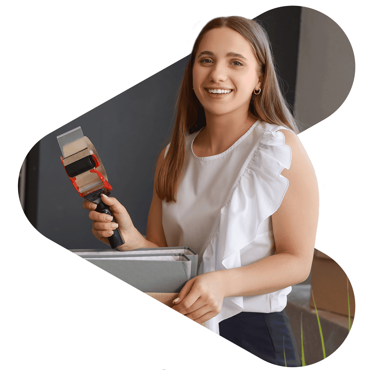 Woman smiling and holding a tape roller